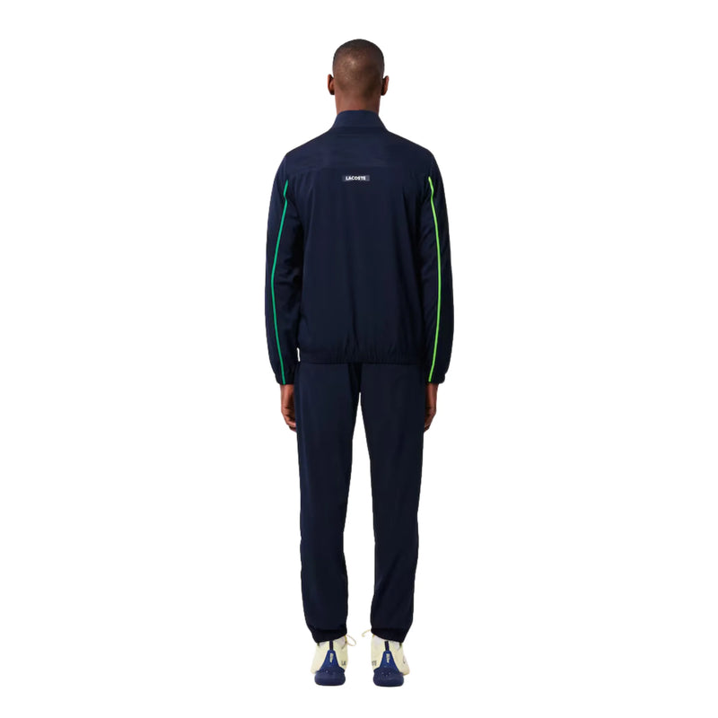 conjunto deportivo lacoste colorblock azul con cocodrilo de silicona verde