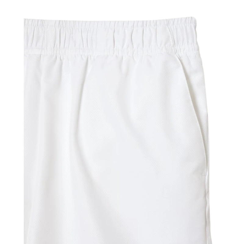 short tenis lacoste hombre color blanco con tejido transpirable