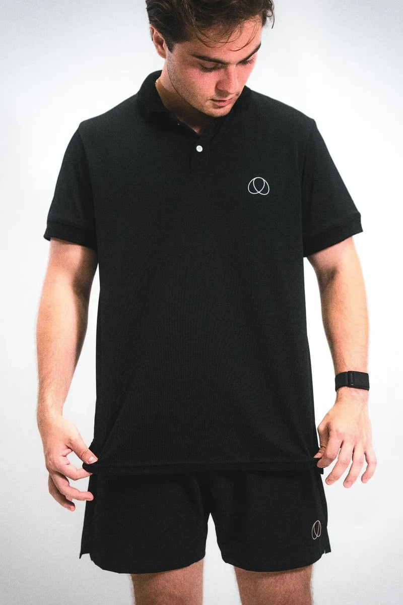 polo deuce negro hombre diseñado para cancha de tenis