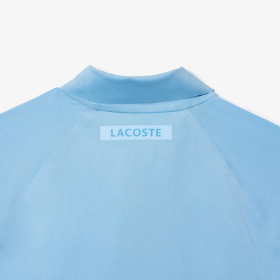 polo lacoste azul celeste para jugar tenis con tecnología ultra dry