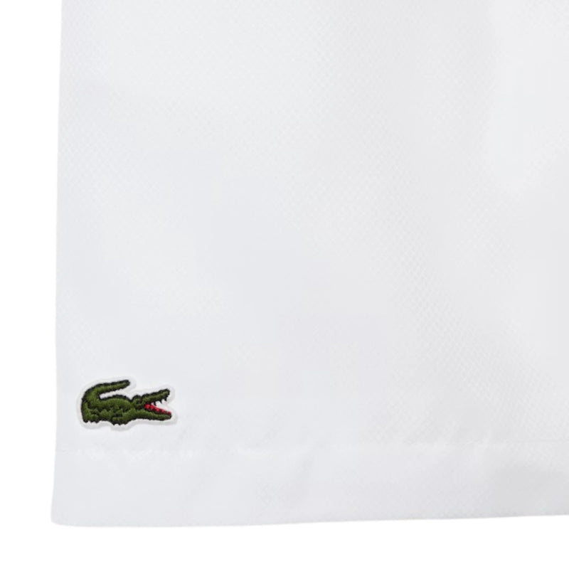 short blanco lacoste con ajuste cómodo para deportes de raqueta