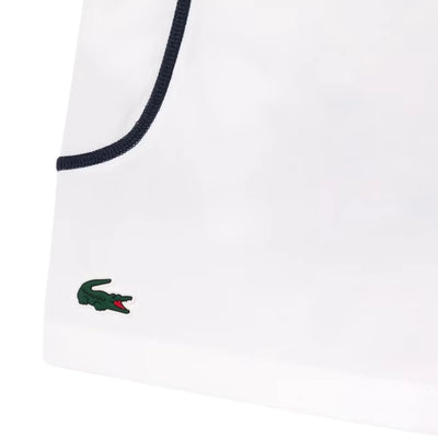 short lacoste blanco con ribete verde ideal para jugar tenis