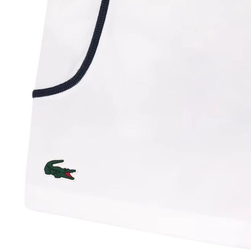 short lacoste blanco con ribete verde ideal para jugar tenis