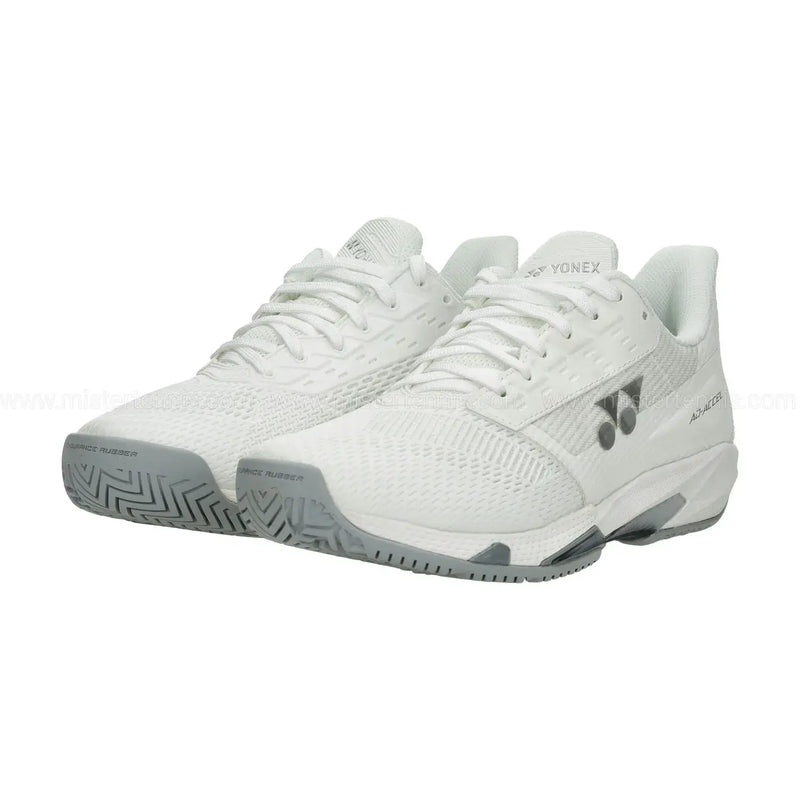 vista lateral de tenis yonex blancos hombre para deportes de raqueta