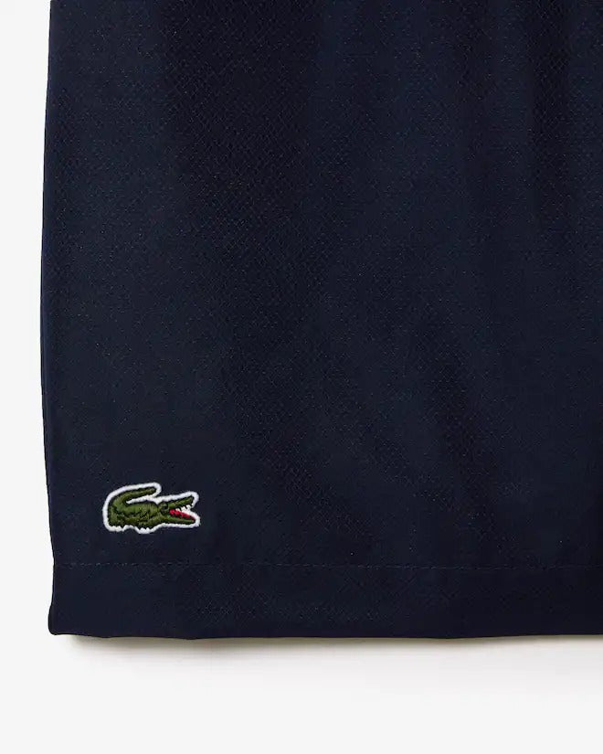 SHORT LACOSTE PARA NIÑOS AZUL MARINO